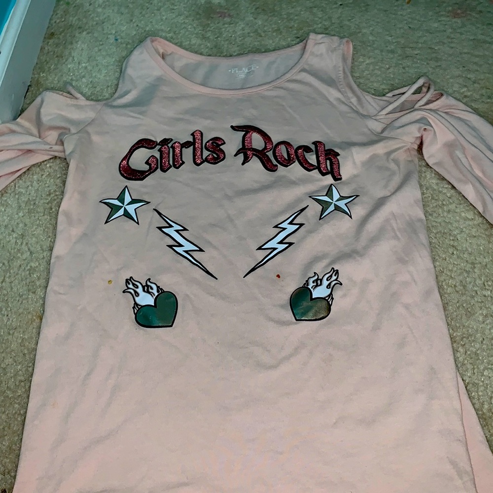 Light pink graphic tee.